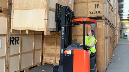 Regal Moving & Storage forklift lifting a storage pod at the Kent storage facility used for Maidstone removals and storage