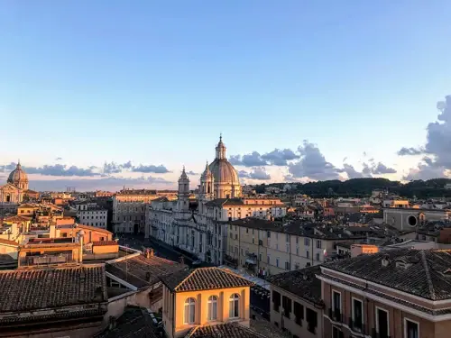 Rooftop view over Rome at sunset, removals to Italy by Regal Moving & Storage