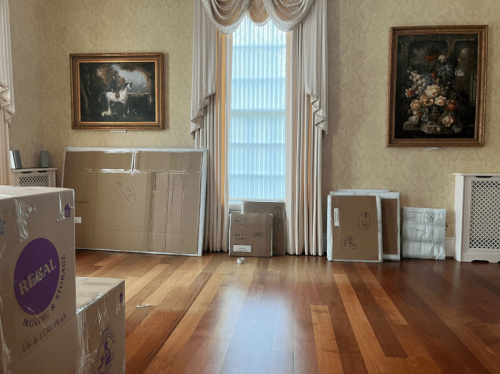 Regal Moving & Storage moving box with picture frames and fine art packed