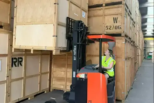 Regal Moving & Storage forklift loading a business removal to Italy